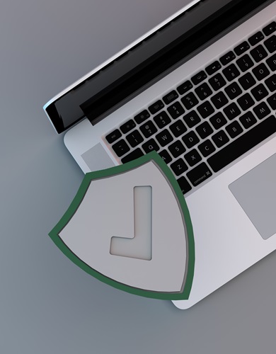 Computer safe against malware or virus attacks. 3d render Computer closeup and Security shield